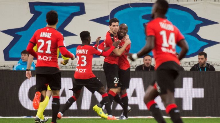 Rennes' French midfielder Yoann Gourcuff (C) celebrates after scoring during the French L1 football match 