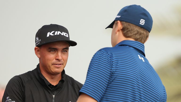  Rickie Fowler of the United States (L), Jordan Spieth of the United States chat on the 14th tee during the continuation of the second round