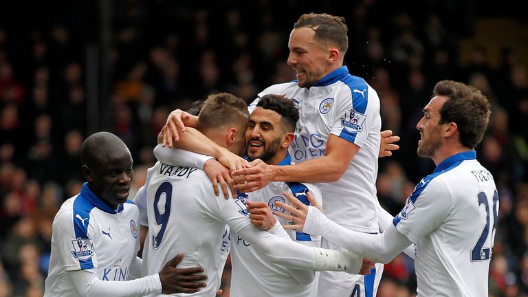 Leicester players mob Riyad Mahrez after his winning goal against Crystal Palace