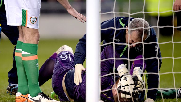 DUBLIN, IRELAND - MARCH 29:  Rob Elliot of the Republic of Ireland suffers a suspected serious injury during the international friendly match between the R