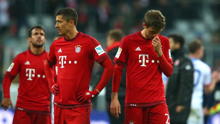 Robert Lewandowski and Thomas Muller are dejected after Bayern Munich lost to Mainz
