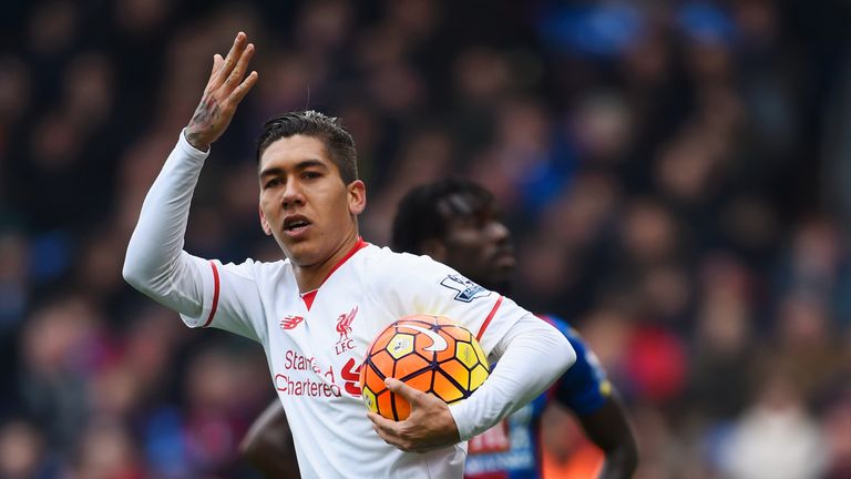 Roberto Firmino of Liverpool celebrates after scoring the equaliser against Crystal Palace