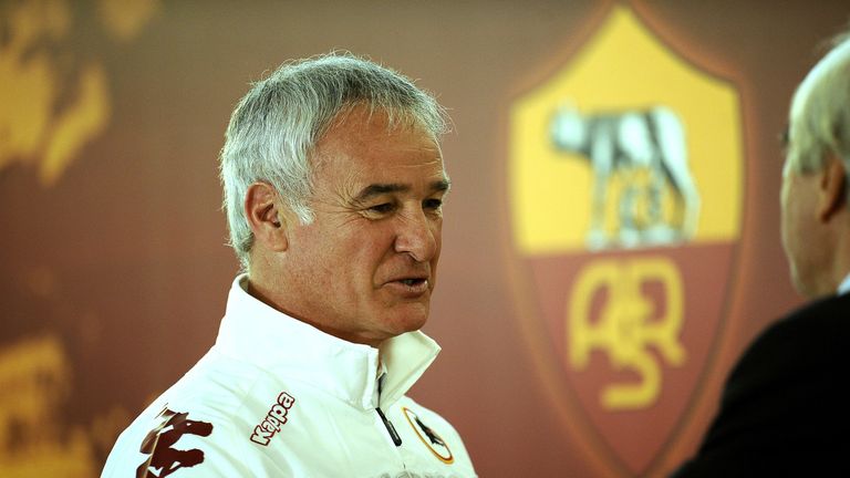 AS Roma's coach Claudio Ranieri walks by the team's logo upon arrival for a press conference in Trigoria training ground on the outskirts of Rome on Febuar