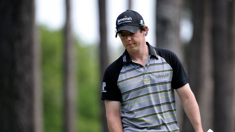 AUGUSTA, GA - APRIL 10:  Rory McIlroy of Northern Ireland walks across the sixth green during the final round of the 2011 Masters Tournament on April 10, 2