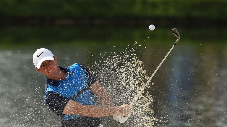 ORLANDO, FL - MARCH 18:   Rory McIlroy of Northern Ireland hits from a green side bunker on the 17th hole during the second round of the Arnold Palmer Invi