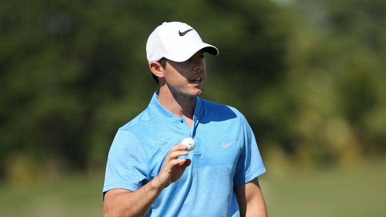 Rory McIlroy of Northern Ireland reacts to his putt on the fourth hole during the final round 