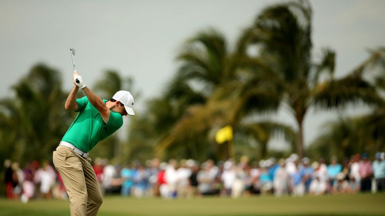 Rory McIlroy of Northern Ireland takes his shot on the second hole during the third round of the World Golf Championships-Cadillac Championship