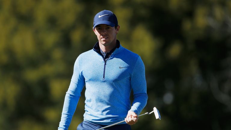 Rory McIlroy of Northern Ireland walks across the 17th green during the second round of the World Golf Championships-Dell Match Pla