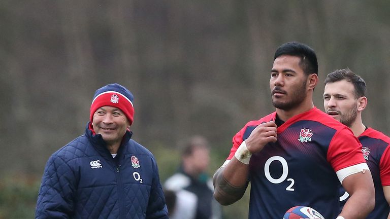 England head coach Eddie Jones on with Manu Tuilagi and Danny Care during a training session