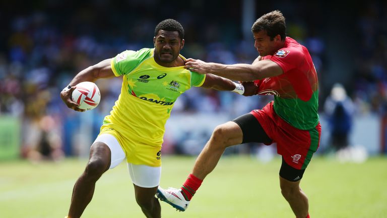 Henry Speight of Australia fends off Tiago Fernandes of Portugal during the 2016 Sydney Sevens