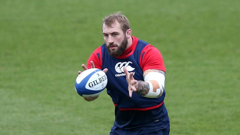 Joe Marler catches the ball during an England training session