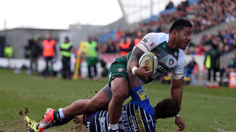 Manu Tuilagi is tackled by Sale's Danny Cipriani
