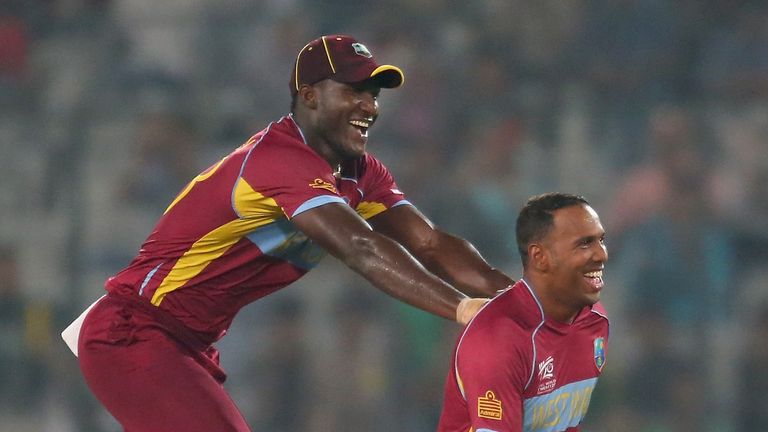 Samuel Badree (right) celebrates with skipper Darren Sammy