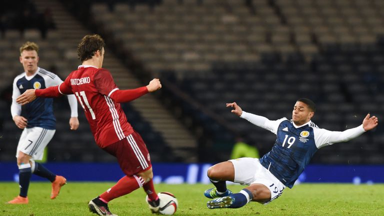 Liam Bridcutt was booked for sliding in on Denmark defender Erik Sviatchenko