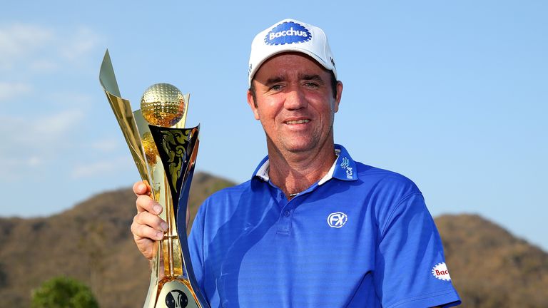 Scott Hend lifts the trophy after winning the True Thailand Classic