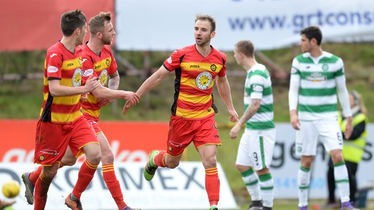 Sean Welsh (centre) celebrates his goal from the spot
