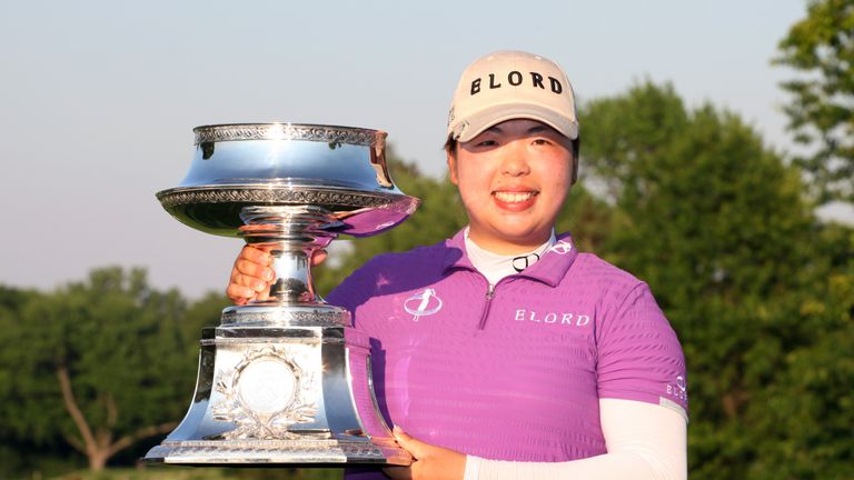 PITTSFORD, NY - JUNE 10: Shanshan Feng of China holds the championship trophy after winning the Wegmans LPGA Championship at Locust Hill Country Club on Ju