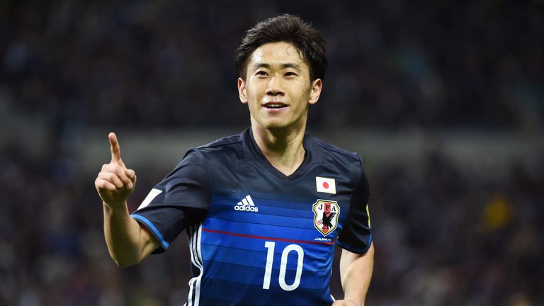Shinji Kagawa scored twice during Japan's rout of Syria