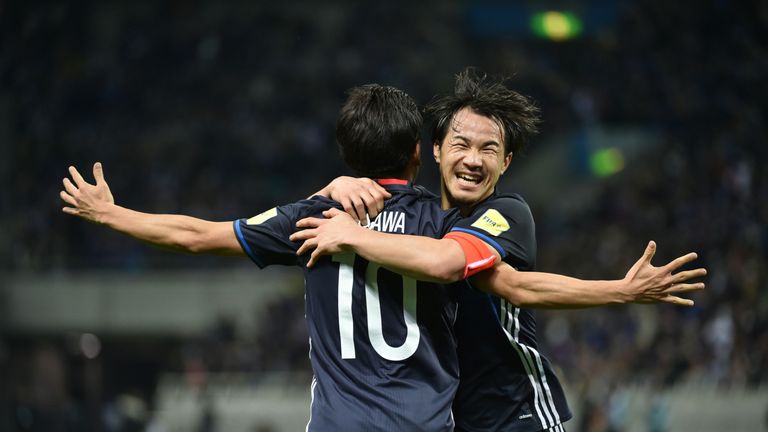  Shinji Kagawa celebrates with Shinji Okazaki during Japan's 2018 World Cup qualifying win