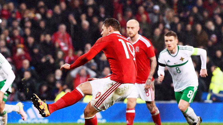 Simon Church scores with his penalty to earn Wales a 1-1 draw with Northern Ireland