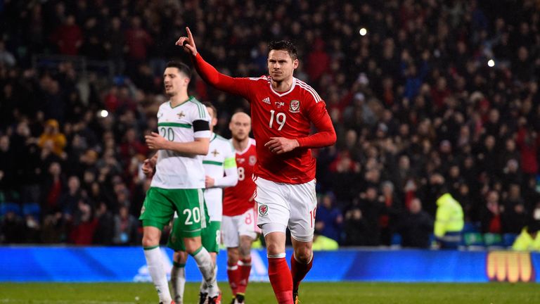 Simon Church of Wales celebrates after scoring a late penalty to level the scores at 1-1 during the international friendly match with Northern Ireland