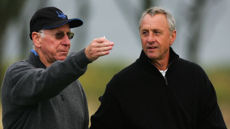 ST. ANDREWS, UNITED KINGDOM - OCTOBER 04:  Sir Bobby Charlton and Johan Cruyff in action during the first round of the Alfred Dunhill Links Championship on