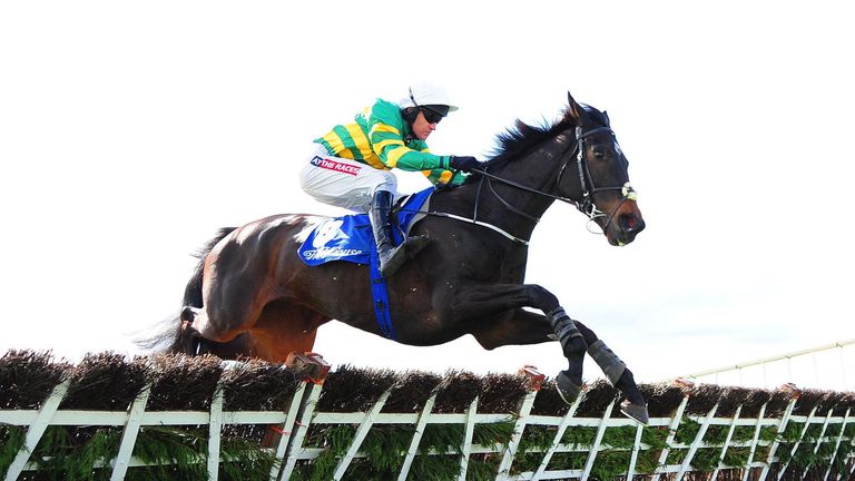 Slowmotion ridden by Barry Geraghty jumps the last before winning the REA Grimes Property Consultants Juvenile Hurdle during day two of the Easter Festival