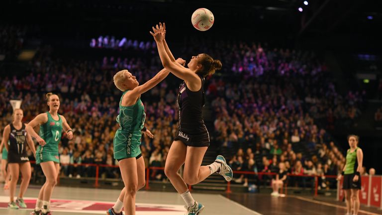 Celtic Dragons' Rebecca Oatley challenges Hertfordshire Mavericks' Sophie Carter to the ball