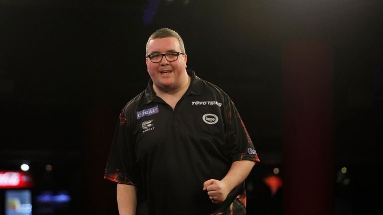 Stephen Bunting celebrates beating Michael van Gerwen at Players Championship Two (picture courtesy of Lawrence Lustig/PDC)