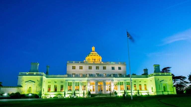 Goldfinger's club, Stoke Park, illuminated in green for St Patrick's Day