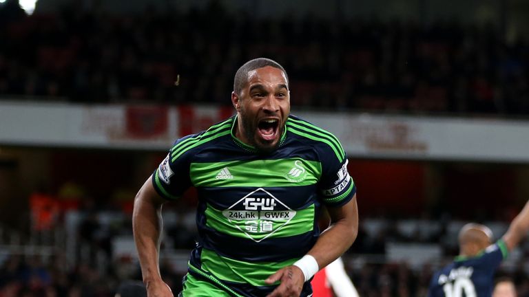 Swansea City's Ashley Williams celebrates scoring his side's second goal against Arsenal
