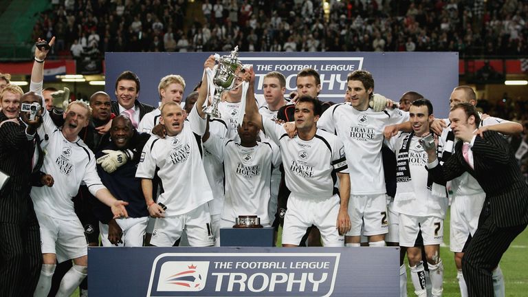 CARDIFF, UNITED KINGDOM - APRIL 02:  Swansea City players celebrate after Swansea City's 2-1 victory during The Football League Trophy Final 