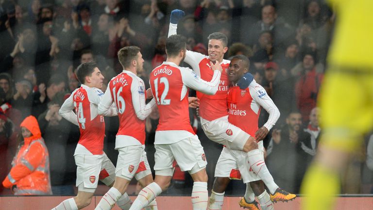Joel Campbell is congratulated after scoring for Arsenal against Swansea