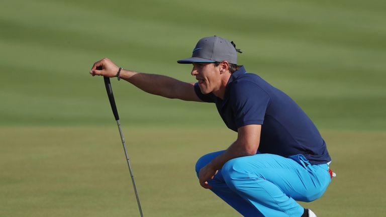 Olesen lined up his putt at the 15th 