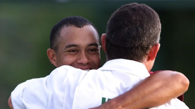 Tiger Wood celebrates with caddie Steve Williams after Masters victory