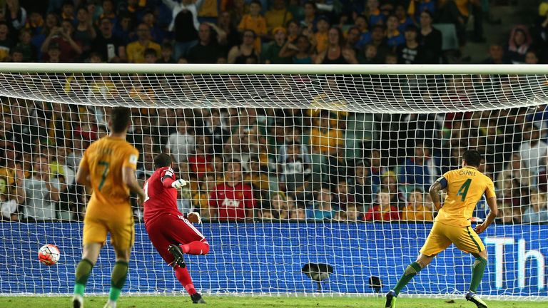 Cahill scores during Australia's rout of Jordan