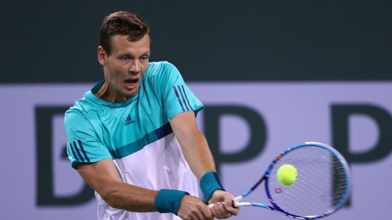 Tomas Berdych of Czech Republic plays a backhand in his match against Borna Coric of Croatia during day eight at Indian Wells Masters