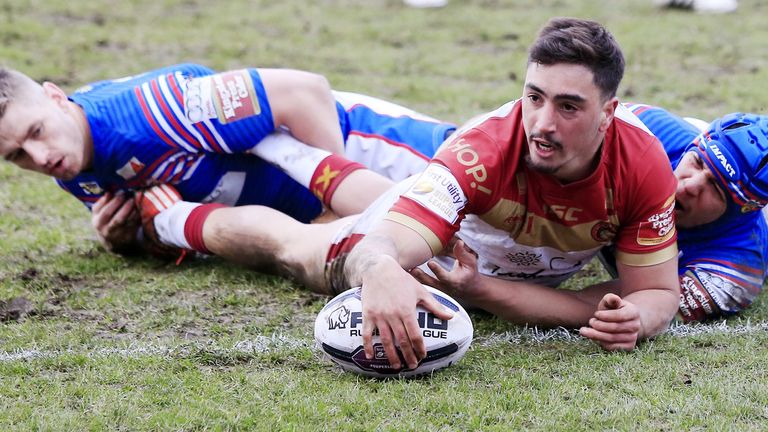 Tony Gigot goes over for Catalans Dragons at Wakefield