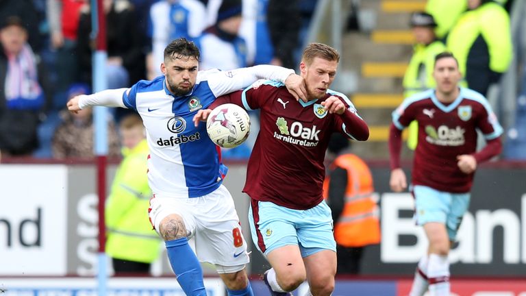 Blackburn Rovers' Tony Watt (left) and Burnley's Rouwen Hennings