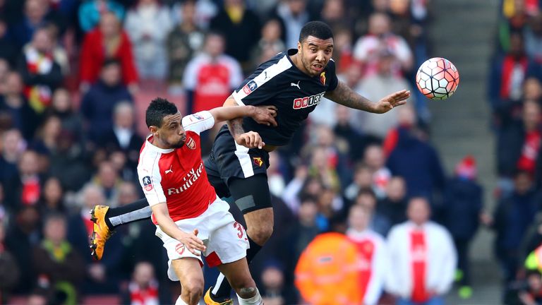 Deeney recovered from the challenge by Gabriel to set up both of Watford's goals in their 2-1 win