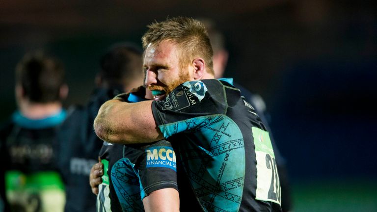 Glasgow Warriors' Tyrone Holmes (right) celebrates at full time 
