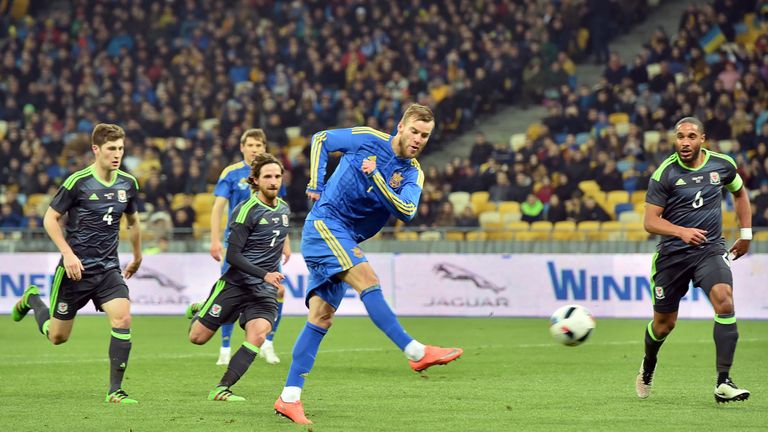 Ukraine's Andriy Yarmolenko (C) shoots to score during the international friendly football match between Ukraine and Wales