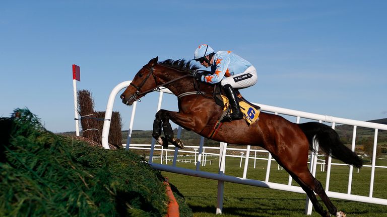 NAAS, IRELAND - APRIL 30: Ruby Walsh riding Un De Sceaux clear the first fence on their way to winning The Ryanair Novice Chase at Punchestown racecourse o