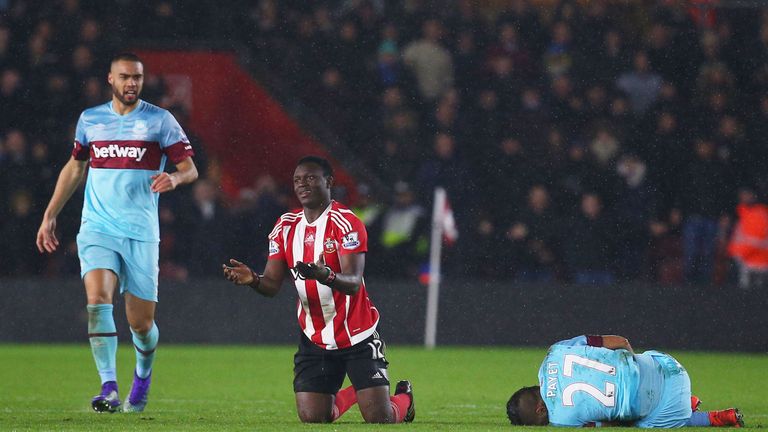 SOUTHAMPTON, ENGLAND - FEBRUARY 06:  Dimitri Payet of West Ham United (R) reacts after a challenge by Victor Wanyama of Southampton (C) who is then sent of