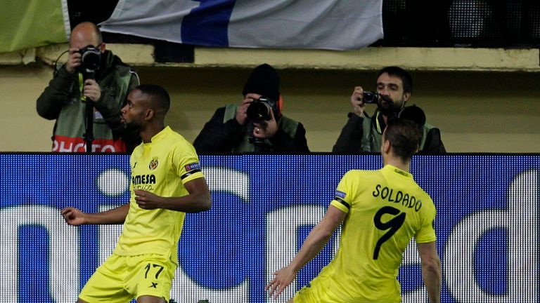 Villarreal's Congolese forward Cedric Bakambu (L) celebrates a goal during the UEFA Europa League Round of 16 first l