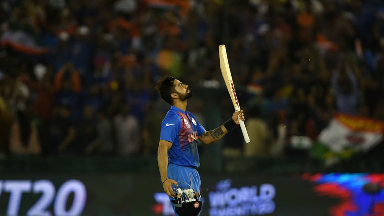 India's Virat Kohli celebrates after victory in the World T20 cricket tournament match between India and Australia