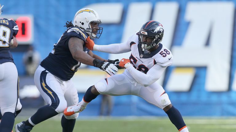 Linebacker Von Miller #58 of the Denver Broncos battles tackel Joe Barksdale #72 of the San Diego Chargers at Qualcomm Stadiu