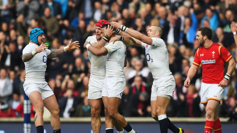 Anthony Watson of England celebrates scoring his team's opening try with James Haskell during the RBS Six Nations