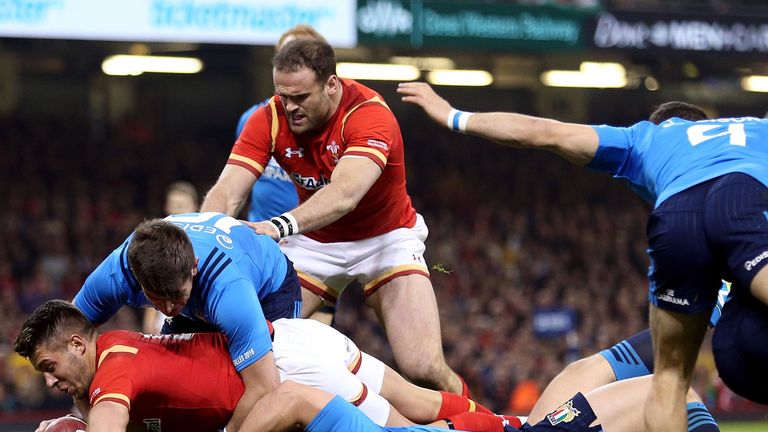 Wales' Rhys Webb scores their first try against Italy