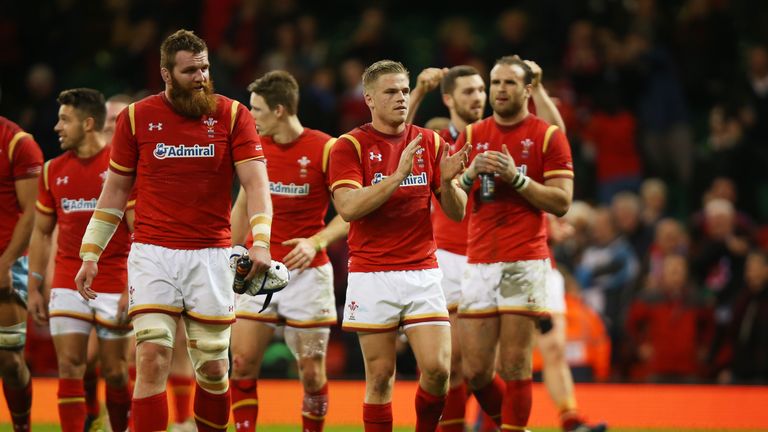 Wales players celebrate following their team's 67-14 victory over Italy